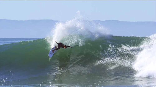 Welcome Beach with Parker Coffin doing a cutback at Rincon.